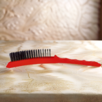 Red Brush to freshen polishing wheels